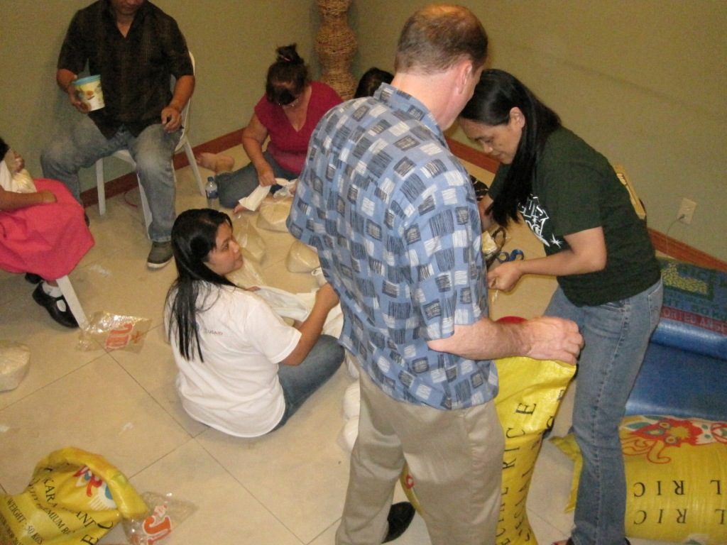 Packing rice for families displaced by Typhoon Labuyo.